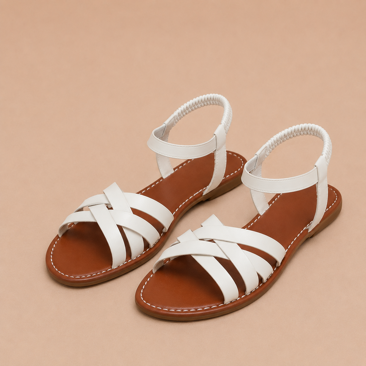 Vera - Sandalias planas con tiras cruzadas y tobillera elástica