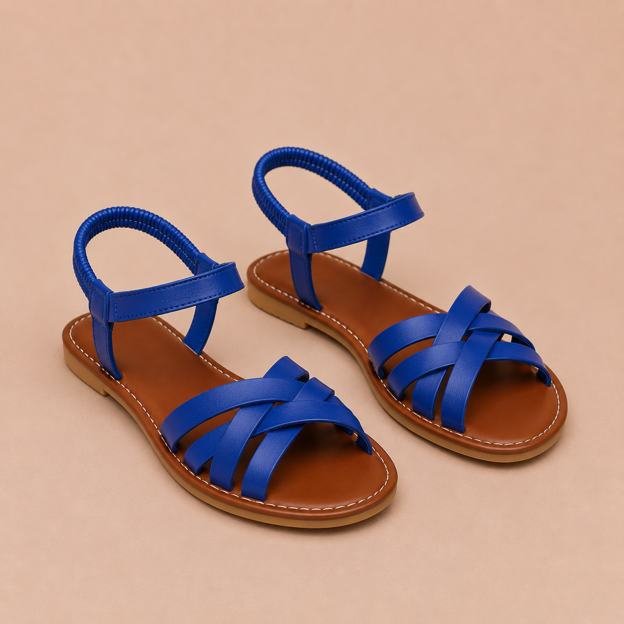 Vera - Sandalias planas con tiras cruzadas y tobillera elástica